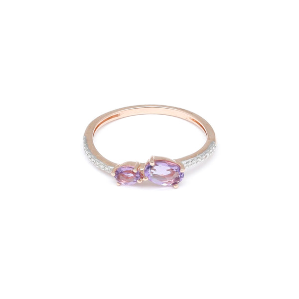 Anillo diseño especial con diamantes y amatistas en oro rosa 14 kilates.