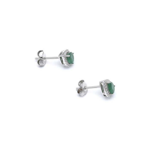 Aretes diseño especial con diamantes y esmeraldas en oro blanco 14 kilates.