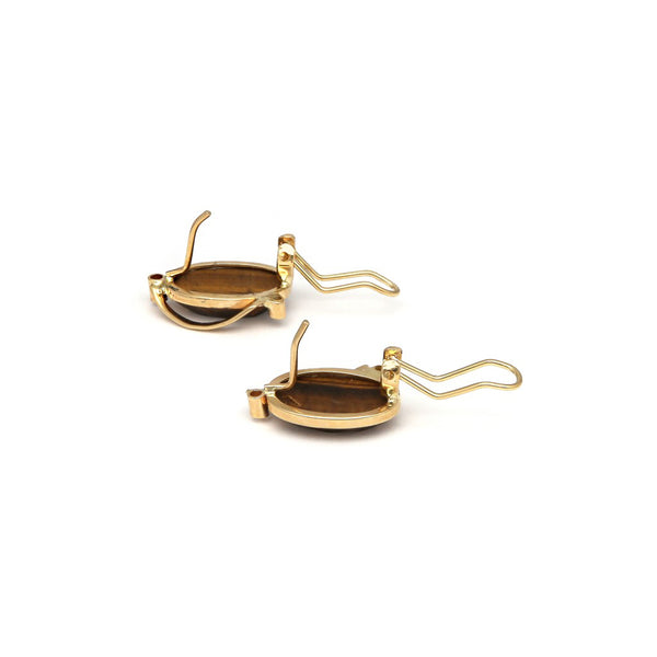 Juego de anillo y aretes diseño especial con ojo de tigre y sintéticos en oro amarillo 14 kilates.