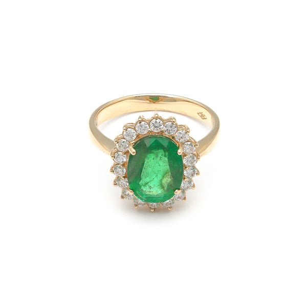 Anillo diseño especial con diamantes y esmeralda en oro amarillo 14 kilates.