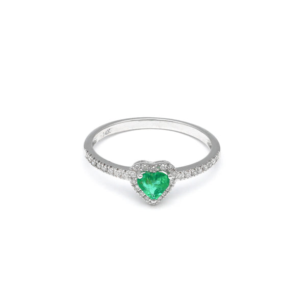 Anillo diseño especial motivo corazón con diamantes y esmeralda en oro blanco 14 kilates.