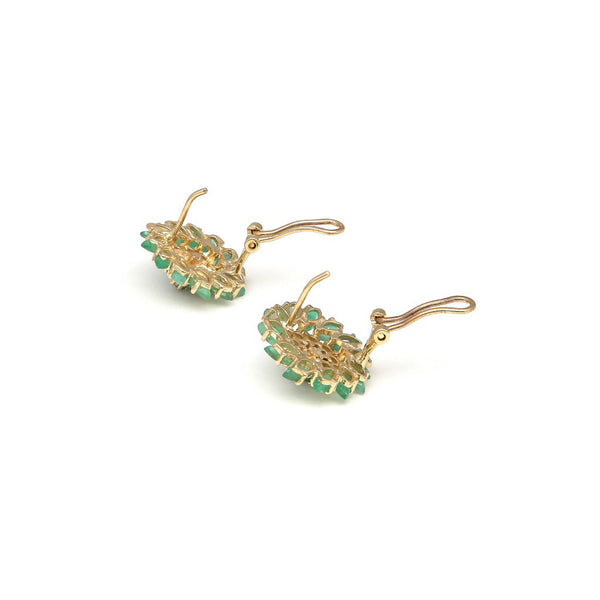 Juego de anillo y aretes diseño especial con esmeraldas en oro amarillo 14 kilates.