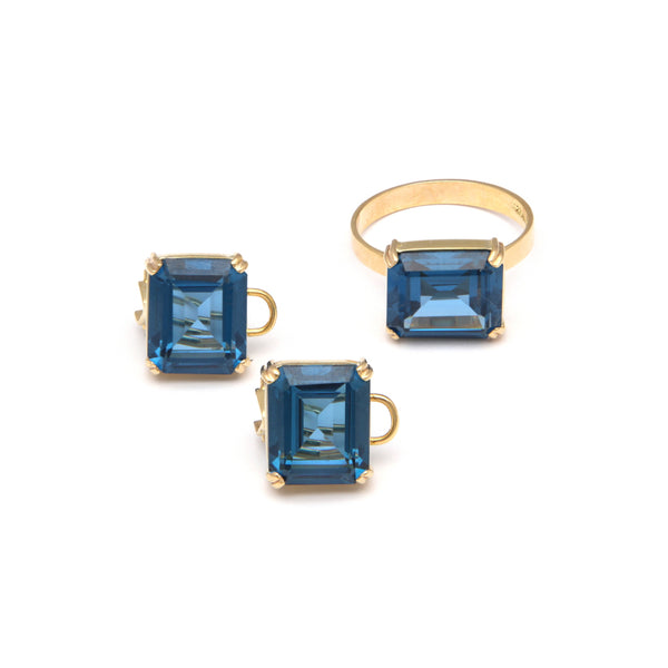 Juego de anillo y aretes diseño especial con blue London en oro amarillo 14 kilates.