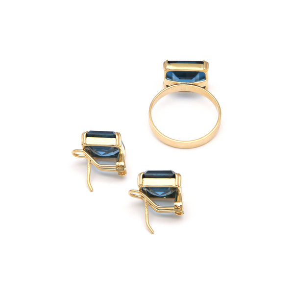 Juego de anillo y aretes diseño especial con blue London en oro amarillo 14 kilates.