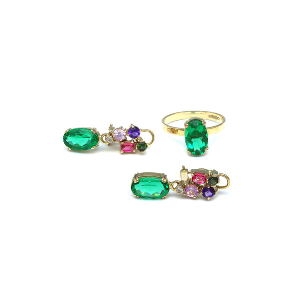 Juego de anillo y aretes diseño especial con obsidiana y gemas en oro amarillo 14 kilates.