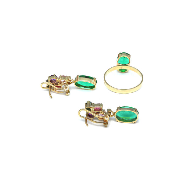 Juego de anillo y aretes diseño especial con obsidiana y gemas en oro amarillo 14 kilates.