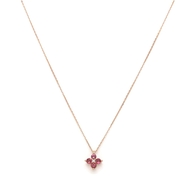 Gargantilla eslabón cruzado con dije motivo flor de diamante y Turmalinas en oro rosa 14 kilates.