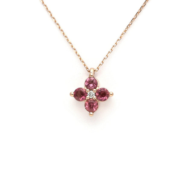 Gargantilla eslabón cruzado con dije motivo flor de diamante y Turmalinas en oro rosa 14 kilates.