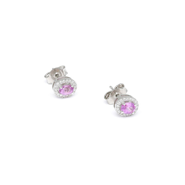 Aretes diseño especial con diamantes y zafiros rosas en oro blanco 14 kilates.