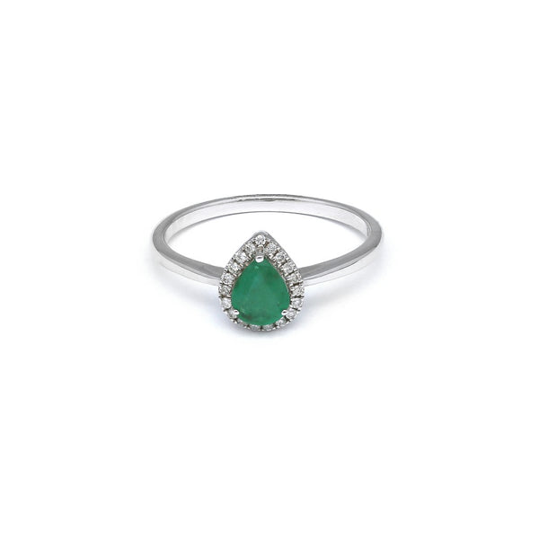Anillo diseño especial motivo gota con diamantes y esmeralda en oro blanco 14 kilates.