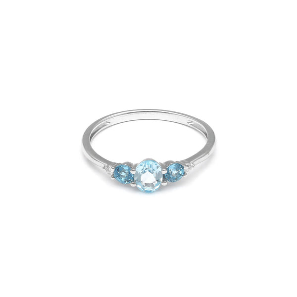 Anillo diseño especial con diamantes y topacios azules en oro blanco 14 kilates.