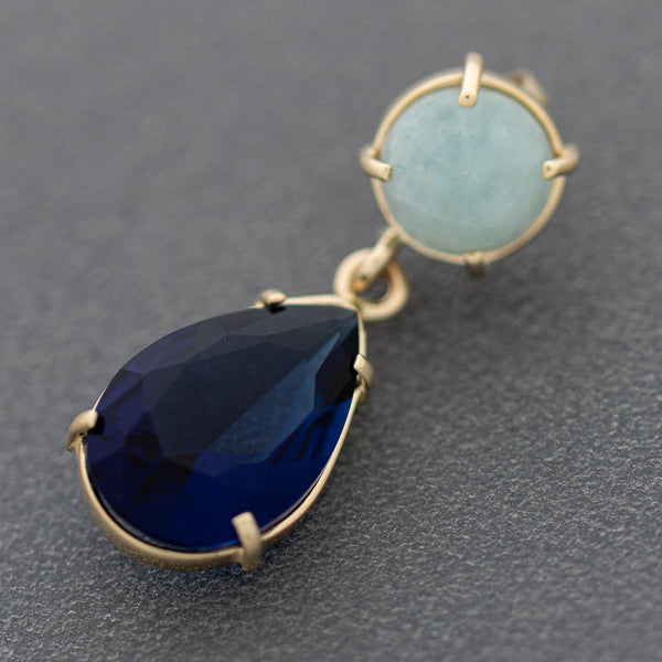 Juego de aretes y dije diseño especial con zafiros y aguamarinas en oro amarillo 14 kilates.