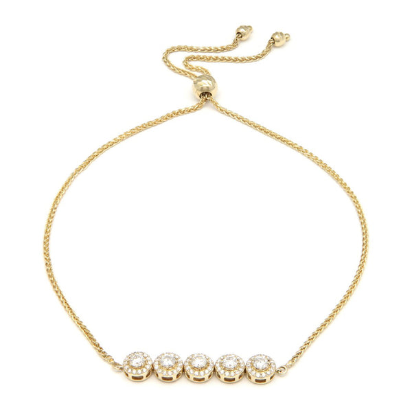 Pulsera eslabón tejido con aplicación de diamantes en oro amarillo 14 kilates.