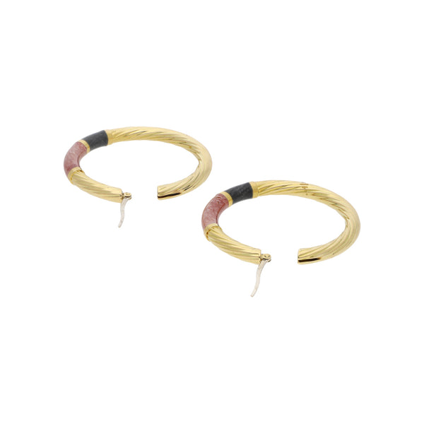 Arracadas torzal con esmalte en oro amarillo 18 kilates.
