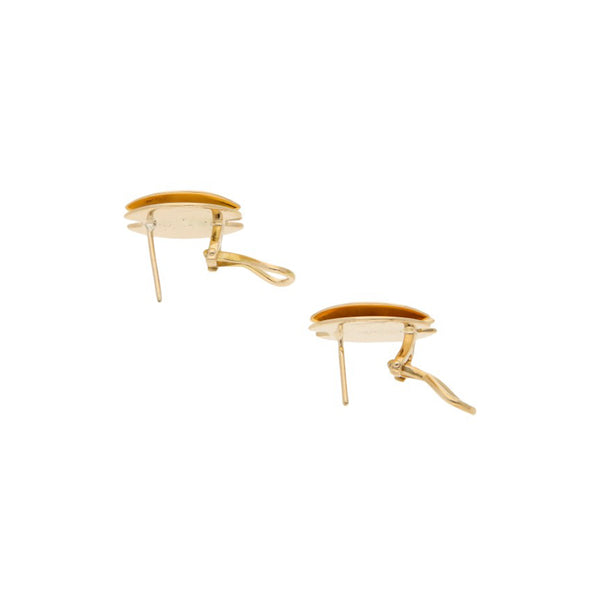 Juego de anillo y aretes estilizados con diamantes en oro dos tonos 18 kilates.