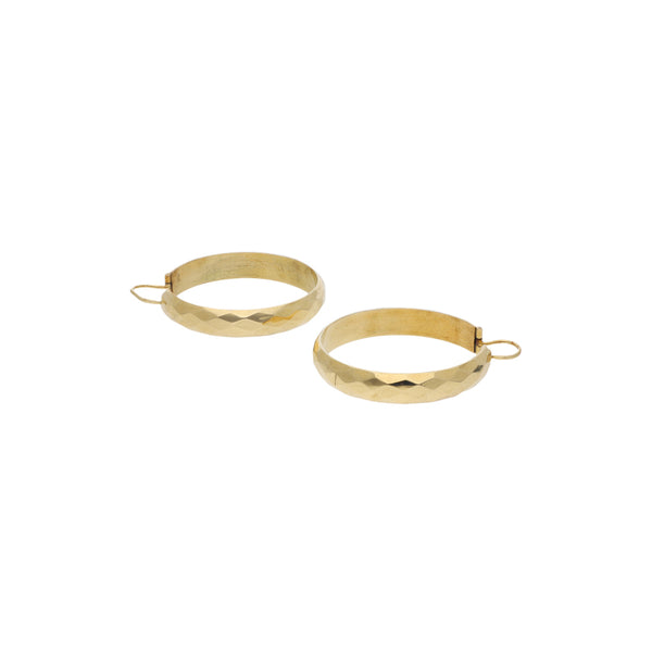 Arracadas facetadas en oro amarillo 18 kilates.