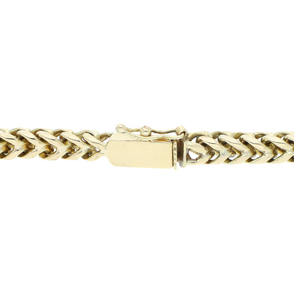 Pulsera eslabón tejido en oro amarillo 14 kilates.