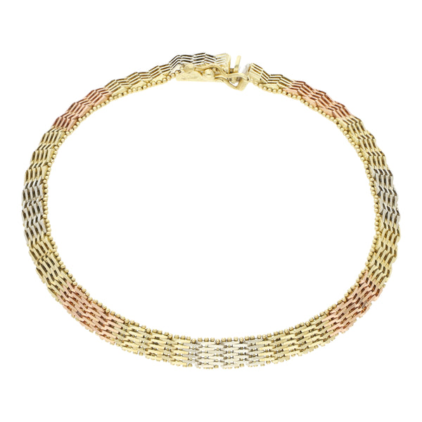 Pulsera eslabón boleado en oro tres tonos 14 kilates.