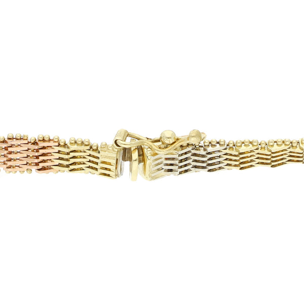 Pulsera eslabón boleado en oro tres tonos 14 kilates.