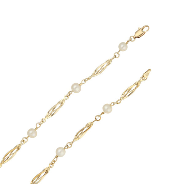 Collar eslabón articulado con aplicaciones de perlas en oro amarillo 14 kilates.