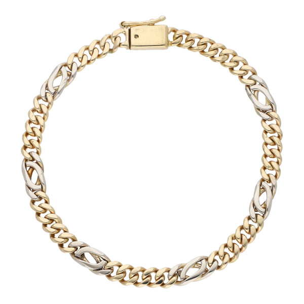 Pulsera eslabón combinado en oro dos tonos 14 kilates.