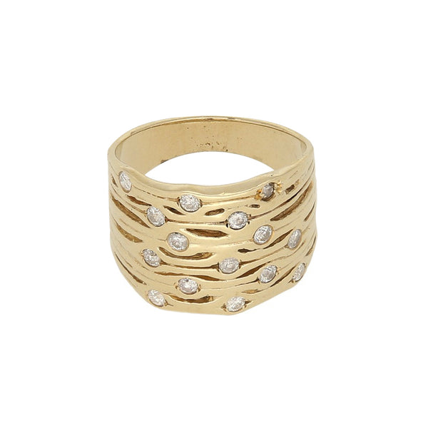 Anillo calado con diamantes en oro amarillo 14 kilates.