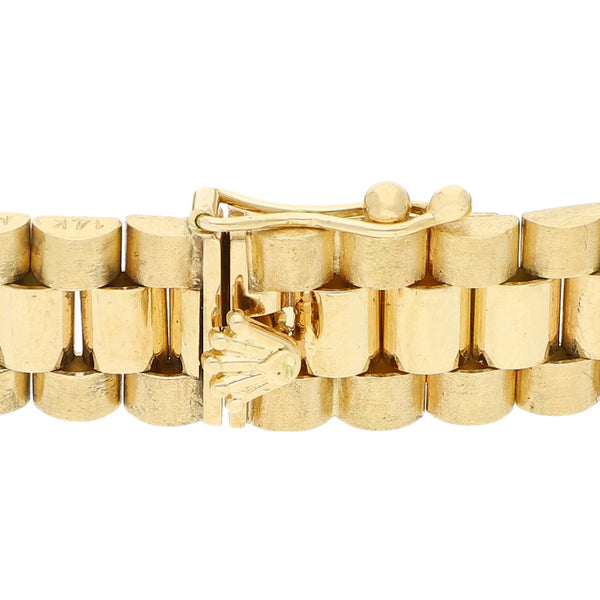 Pulsera eslabón articulado en oro amarillo 14 kilates.