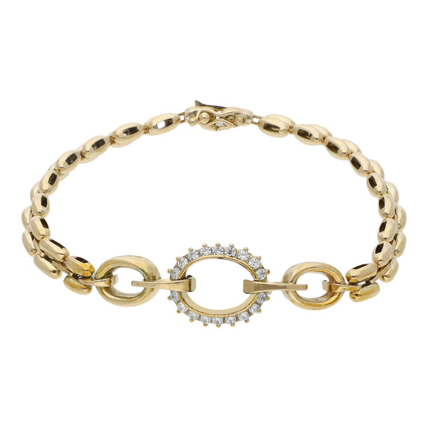 Pulsera eslabón articulado con aplicación y sintéticos en oro amarillo 14 kilates.
