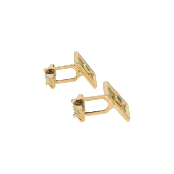 Mancuernillas diseño especial con esmeraldas en oro amarillo 18 kilates.