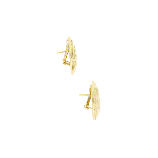 Aretes laminados en oro amarillo 14 kilates.