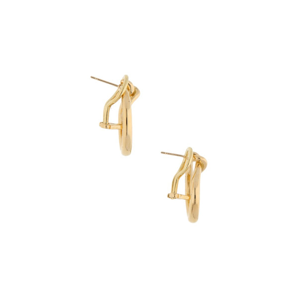 Aretes diseño estilizado firma Tane en oro amarillo 18 kilates.