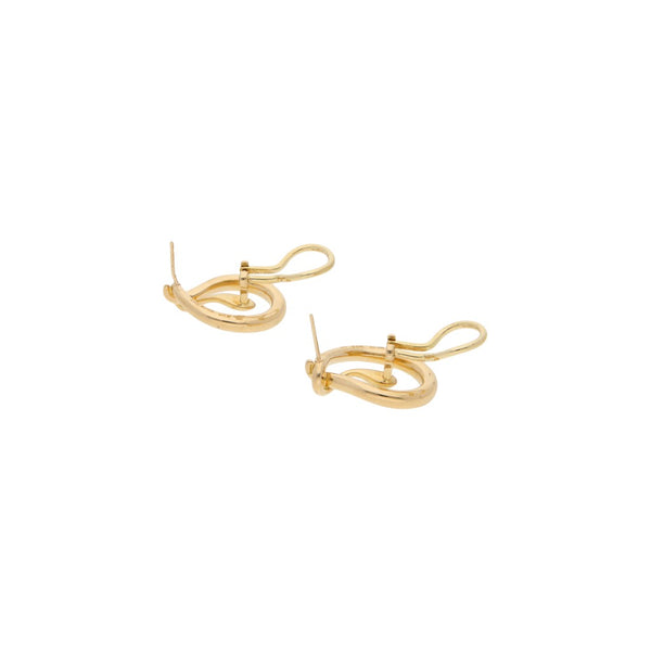 Aretes diseño estilizado firma Tane en oro amarillo 18 kilates.