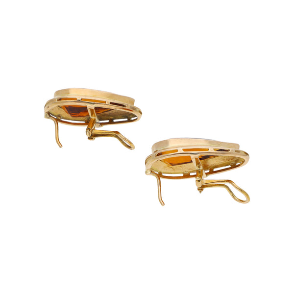 Aretes lisos motivo gota con sintético en oro amarillo 18 kilates.