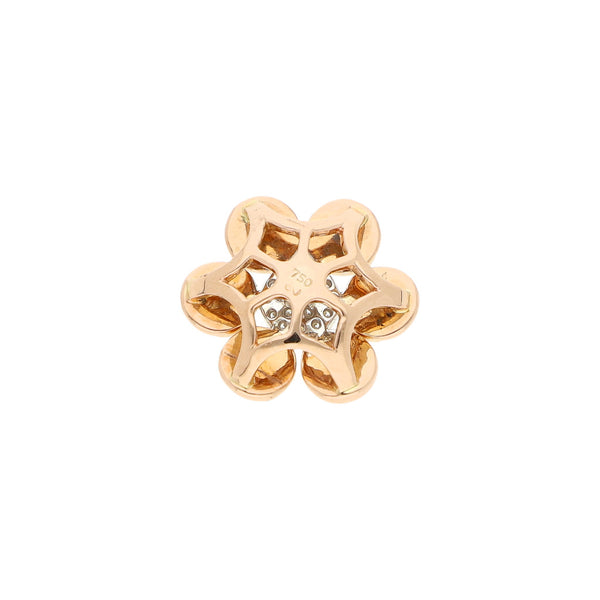 Dije diseño especial motivo flor con diamantes en oro dos tonos 18 kilates.