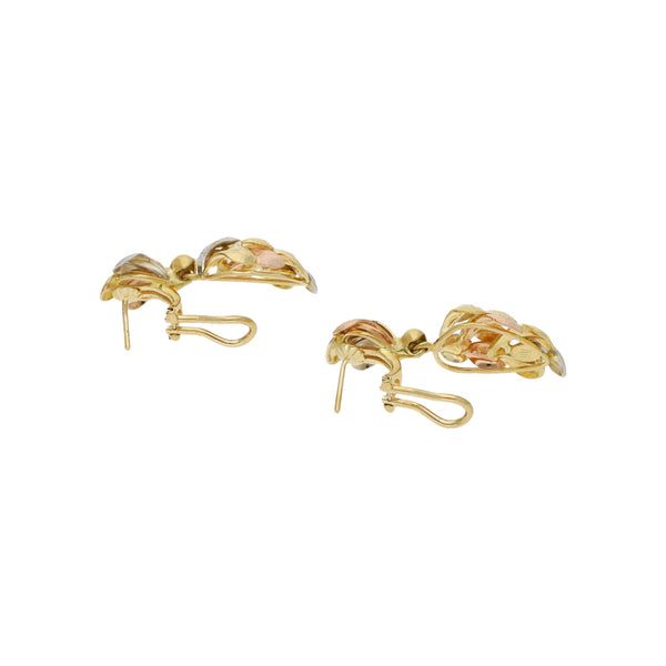 Aretes diseño especial en oro tres tonos 18 kilates.
