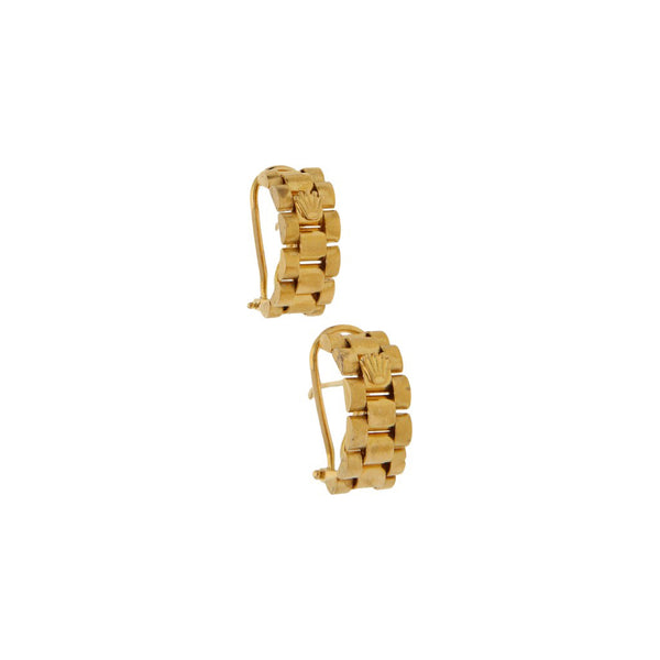 Aretes diseño especial en oro amarillo 18 kilates.