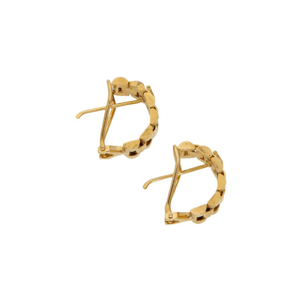 Aretes diseño especial en oro amarillo 18 kilates.