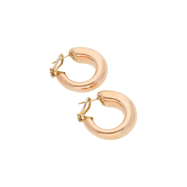 Arracadas huecas en oro rosa 14 kilates.