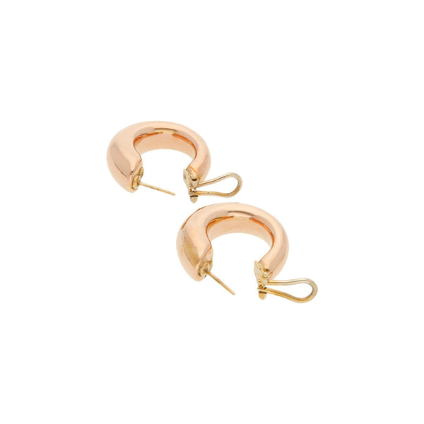 Arracadas huecas en oro rosa 14 kilates.