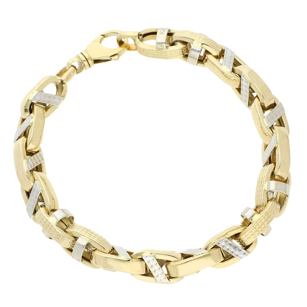 Pulsera eslabón cruzado en oro dos tonos 14 kilates.