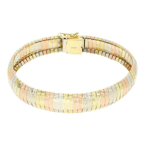 Pulsera eslabón laminado en oro tres tonos 14 kilates.