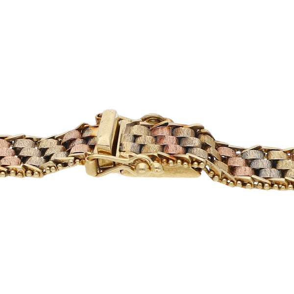 Pulsera eslabón boleado en oro tres tonos 14 kilates.