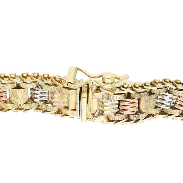 Pulsera eslabón boleado en oro tres tonos 14 kilates.