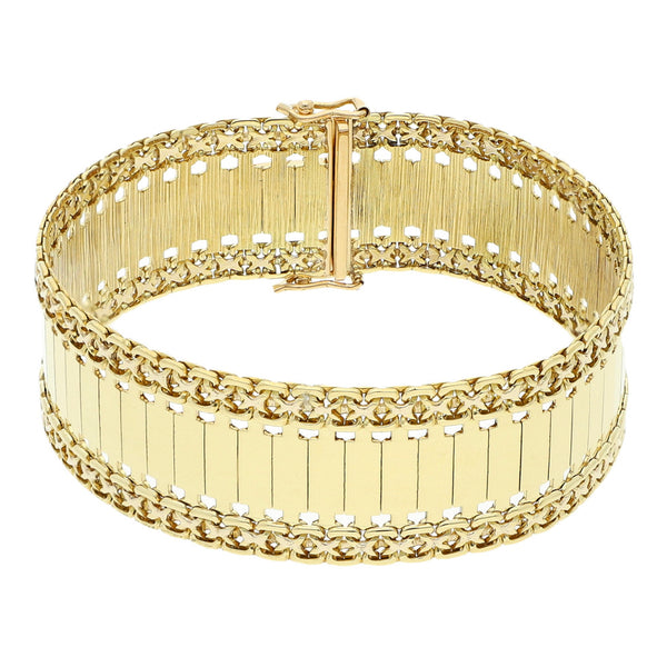 Pulsera eslabón laminado en oro amarillo 18 kilates.