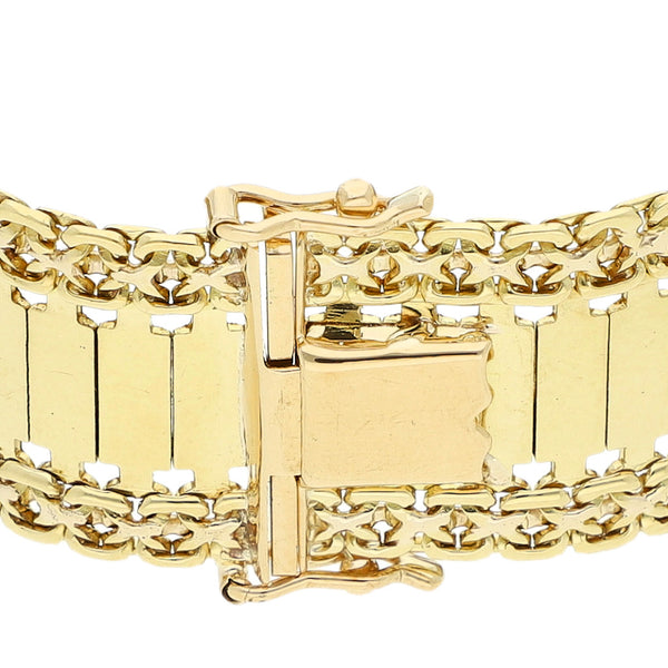 Pulsera eslabón laminado en oro amarillo 18 kilates.