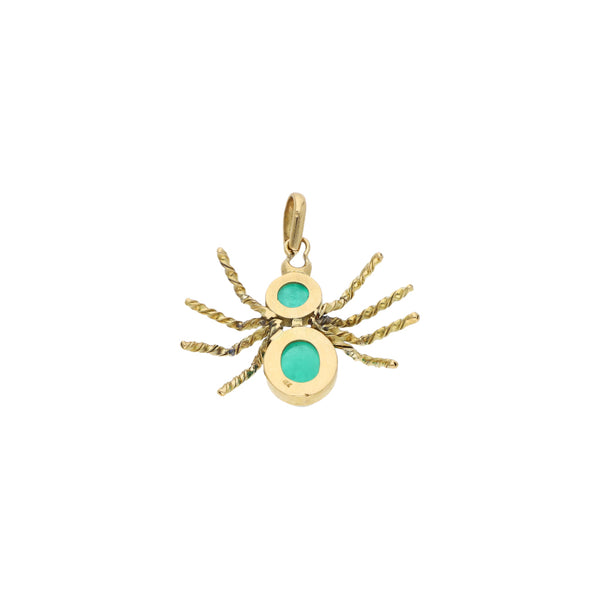 Dije diseño especial motivo araña con sintéticos en oro amarillo 18 kilates.