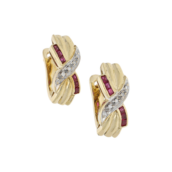 Aretes diseño especial con diamantes y rubíes en oro amarillo 14 kilates.