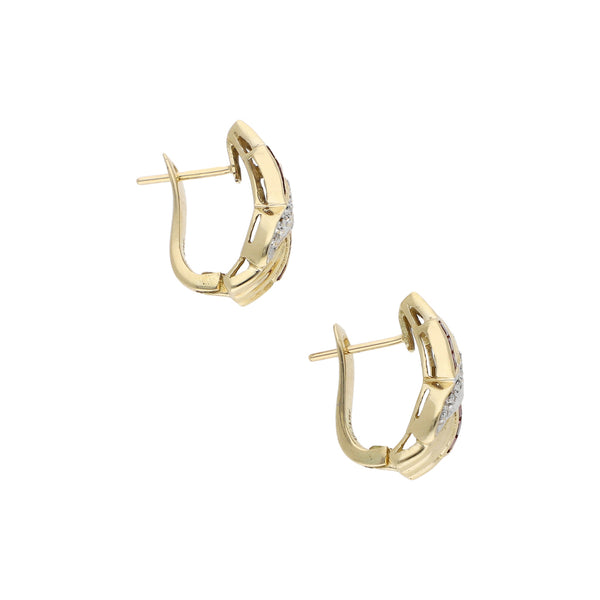 Aretes diseño especial con diamantes y rubíes en oro amarillo 14 kilates.