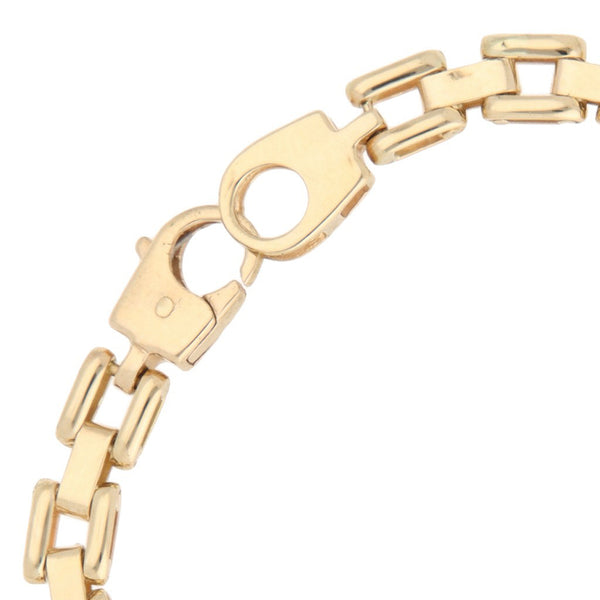 Pulsera eslabón articulado en oro dos tonos 14 kilates.