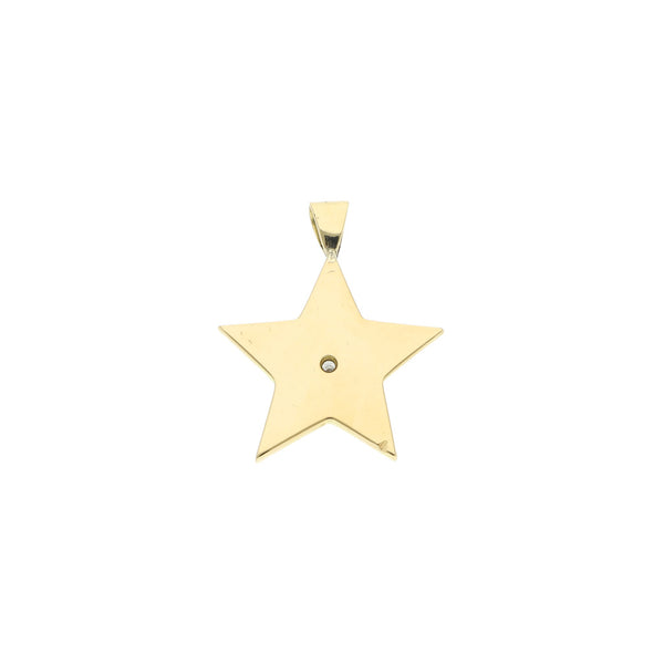 Dije liso motivo estrella con diamante en oro amarillo 18 kilates.